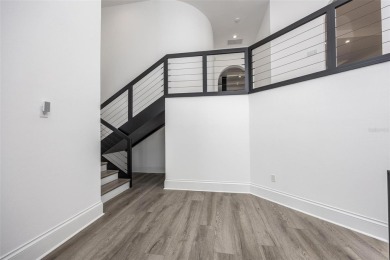 Set on a corner lot with over 200 feet of waterfront, this