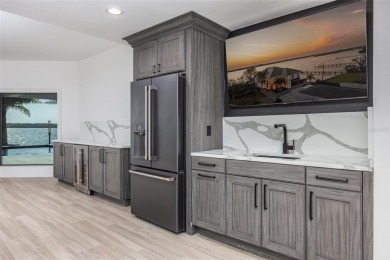 Set on a corner lot with over 200 feet of waterfront, this