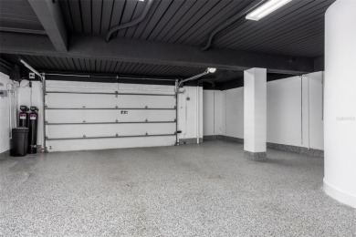 Set on a corner lot with over 200 feet of waterfront, this