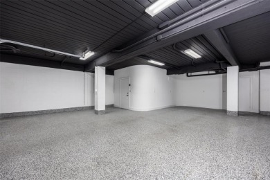 Set on a corner lot with over 200 feet of waterfront, this