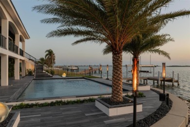 Set on a corner lot with over 200 feet of waterfront, this