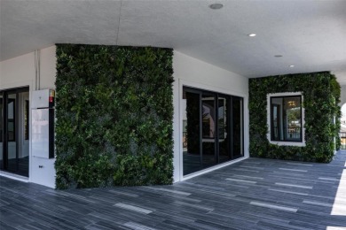 Set on a corner lot with over 200 feet of waterfront, this