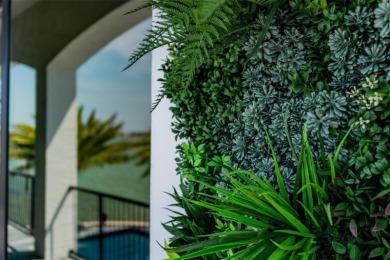 Set on a corner lot with over 200 feet of waterfront, this