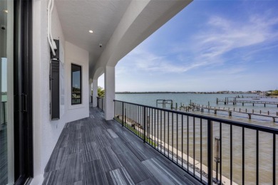 Set on a corner lot with over 200 feet of waterfront, this