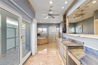 This extraordinary waterfront estate spans over 4,300 sq. ft. of