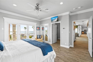 This extraordinary waterfront estate spans over 4,300 sq. ft. of