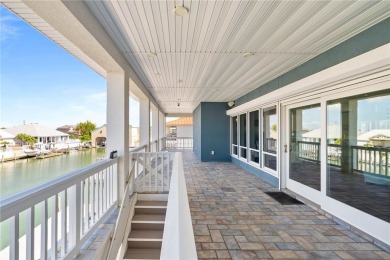 This extraordinary waterfront estate spans over 4,300 sq. ft. of