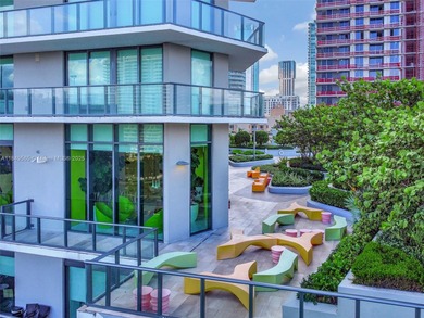 Beautiful 2 bedroom, 2 bath corner apartment with a den that can