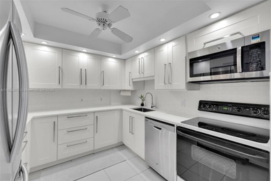 Live the Florida dream in this beautifully updated 2-bed, 2-bath