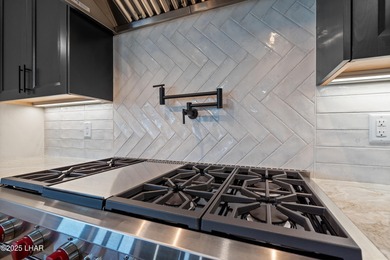 This stunning new construction contemporary home offers