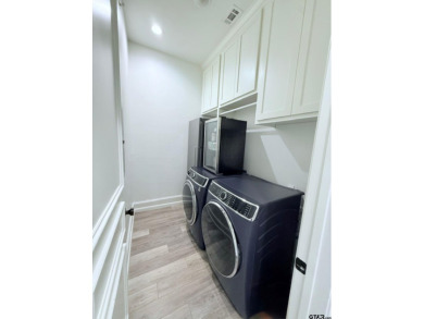 Updated kitchen and bathrooms!  Welcome to refined luxury living