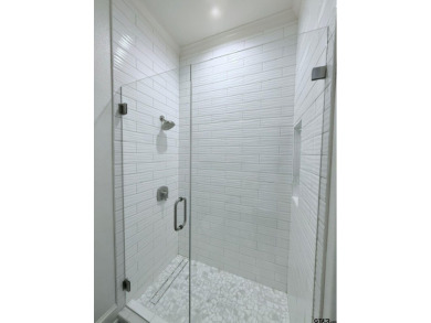 Updated kitchen and bathrooms!  Welcome to refined luxury living