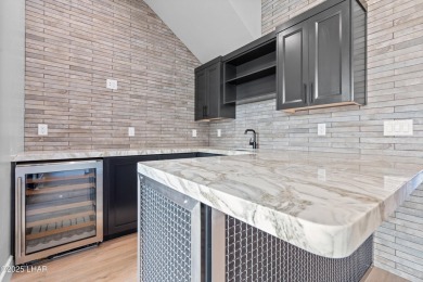 This stunning new construction contemporary home offers