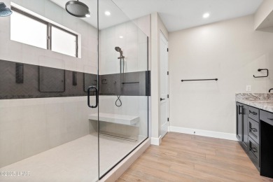 This stunning new construction contemporary home offers