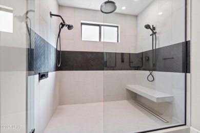 This stunning new construction contemporary home offers