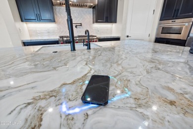 This stunning new construction contemporary home offers