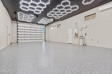 This stunning new construction contemporary home offers