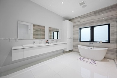 Modern masterpiece on expansive grounds, boasting soaring 20-ft