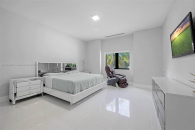 Modern masterpiece on expansive grounds, boasting soaring 20-ft