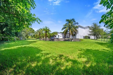 Modern masterpiece on expansive grounds, boasting soaring 20-ft