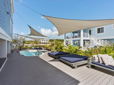 Tropical Luxury meets Coastal Living in the heart of Key Largo!