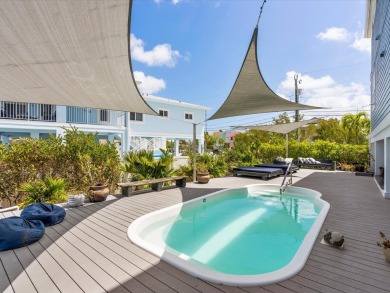 Tropical Luxury meets Coastal Living in the heart of Key Largo!