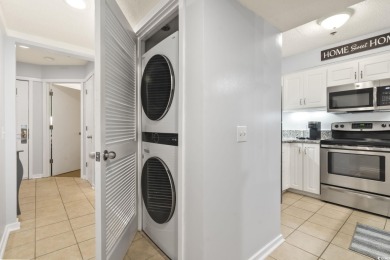 Motivated Seller! This top-floor 2-bedroom, 2-bath condo in