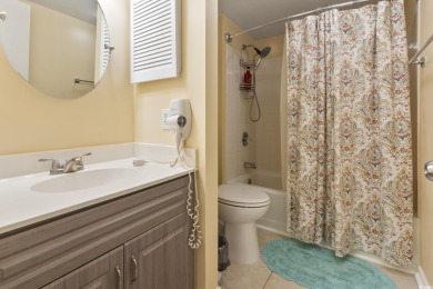 Motivated Seller! This top-floor 2-bedroom, 2-bath condo in