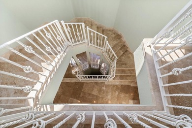 59 Ballamore Cove is a custom-built, one-owner home with Old