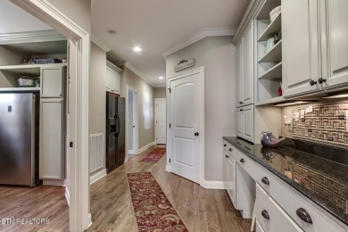 Experience refined living in this stunning 6,513 sq. ft