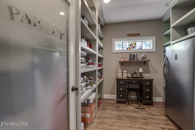 Experience refined living in this stunning 6,513 sq. ft