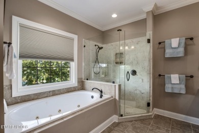 Experience refined living in this stunning 6,513 sq. ft