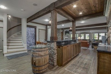 Experience refined living in this stunning 6,513 sq. ft