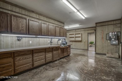 Experience refined living in this stunning 6,513 sq. ft