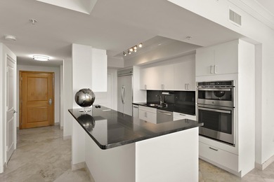 Location and views. Rare opportunity to own a turn-key two-level