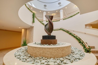 Experience elevated coastal living from this modern Gulf-front