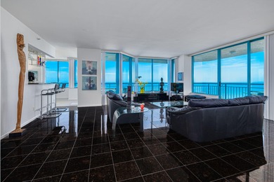 Experience elevated coastal living from this modern Gulf-front