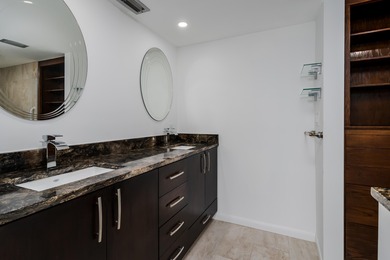 This spacious waterfront penthouse condo offers a luxurious