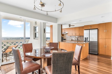 Penthouse G at Cloister Towers presents a rare opportunity to