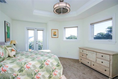 Paradise found. Welcome to an exceptional canal-front retreat on