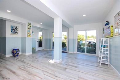 Paradise found. Welcome to an exceptional canal-front retreat on