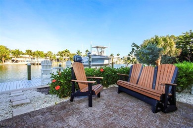 Paradise found. Welcome to an exceptional canal-front retreat on