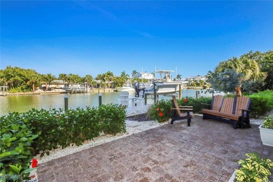 Paradise found. Welcome to an exceptional canal-front retreat on