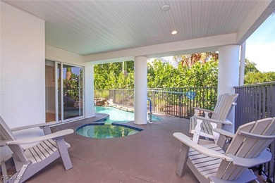 Paradise found. Welcome to an exceptional canal-front retreat on