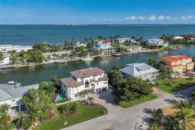 Paradise found. Welcome to an exceptional canal-front retreat on