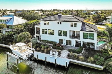 Paradise found. Welcome to an exceptional canal-front retreat on