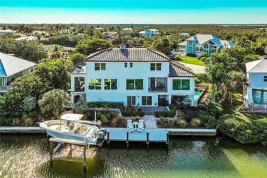 Paradise found. Welcome to an exceptional canal-front retreat on