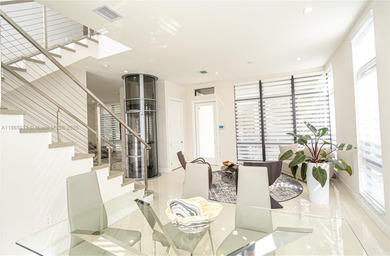 Discover LUXURY living in the heart of DOWNTOWN DORAL w/this