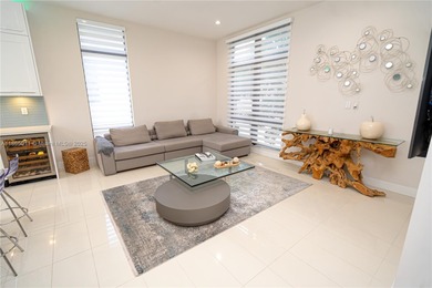 Discover LUXURY living in the heart of DOWNTOWN DORAL w/this