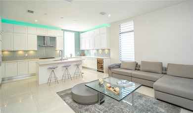 Discover LUXURY living in the heart of DOWNTOWN DORAL w/this
